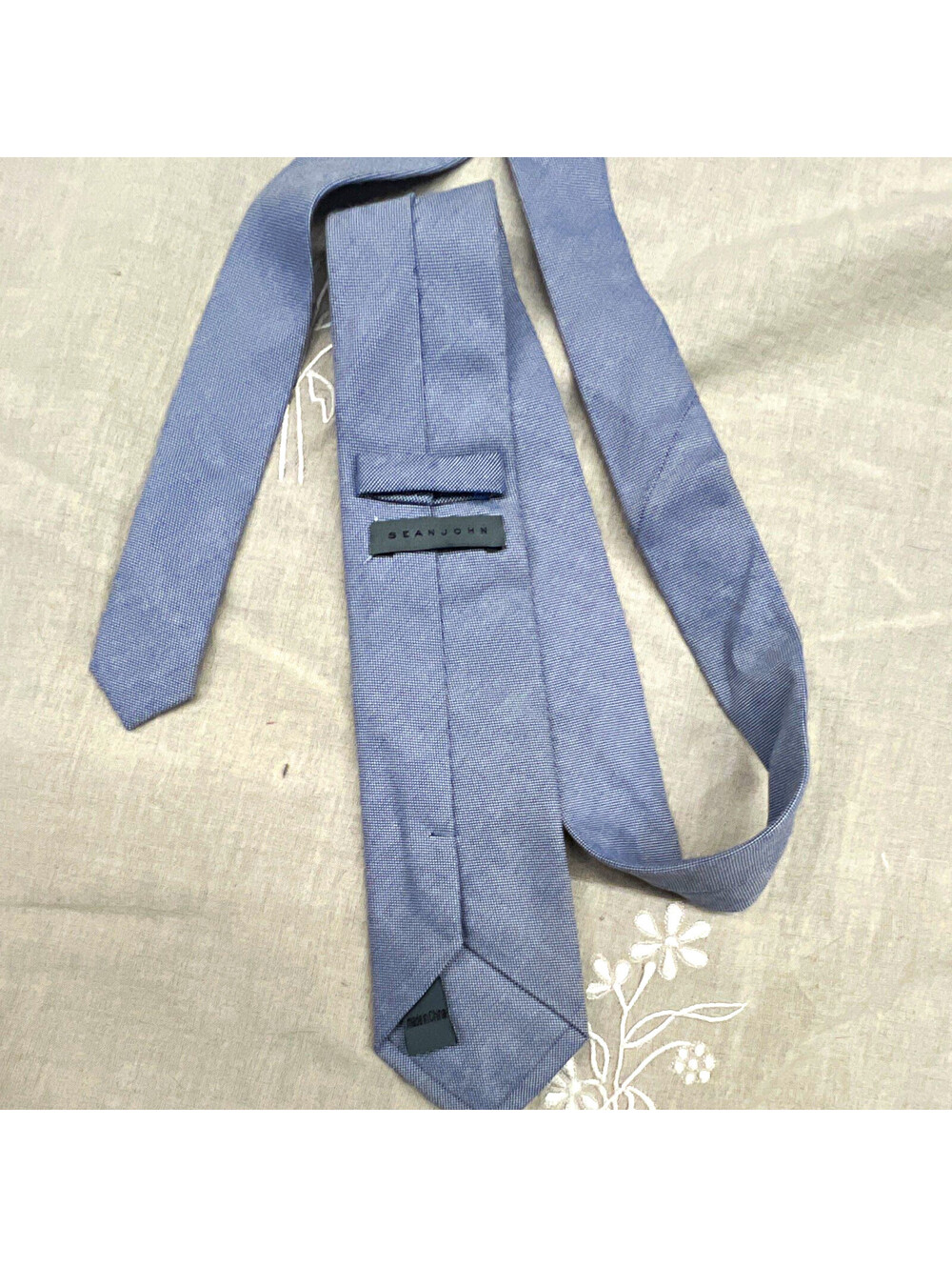 Sean John Men's Woven Pointed Tie Blue/White Solid with Logo Accent
